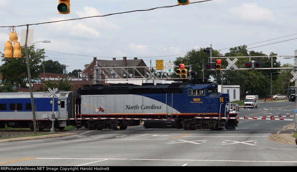 RNCX 1893 leads train 74 across Fayetteville Street